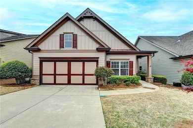 Craftsman house featuring driveway, a standing sea