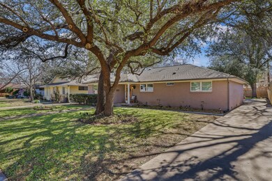 Single story home featuring fence, a front lawn, a