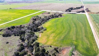 Birds eye view of property with a rural view