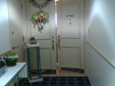 Exterior Front. Entry way into unit with double do
