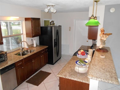 7000 NW 76th Ct, Tamarac, FL 33321 - photo 3