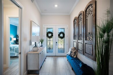 Foyer looking toward front doors and front guest bedroom