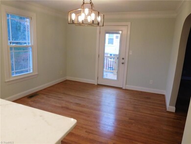Dining Room.  Door leads out to all new deck.  This deck is perfect for grilling on!