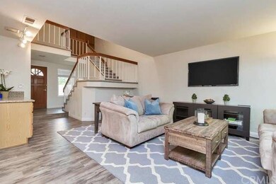 Wood-look laminated floor beautifies the formal li