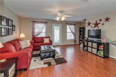 Just BEAUTFIUL new hardwoods! Has open floor plan of 1,360 sq.ft. & built in 2007.  Monthly dues are $95 (exterior maintenance, grounds maintenance, insurance, etc.) 
