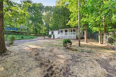 View of yard featuring a porch