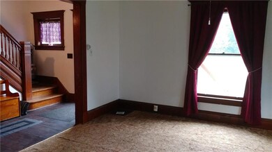 View of entry foyer from living area
