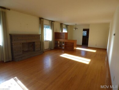 Living room with archway to FR