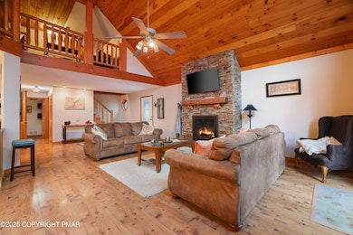 Family Room Stone FP Stairway