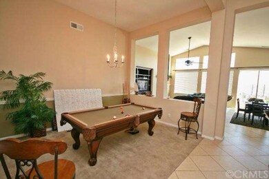 Wide entry hallway with ceramic flooring, soaring 