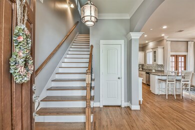 Solid wood floors are throughout the home and were