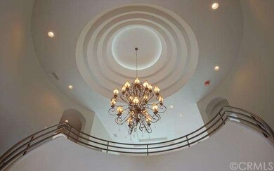 Main foyer entrance showcasing elegant 20ft. coffe