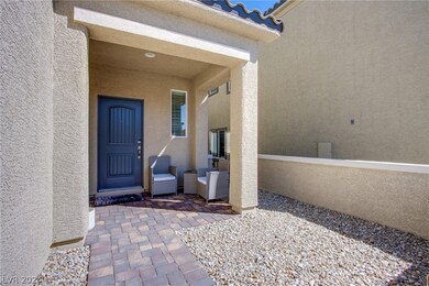 The front porch and entry, with pavers.