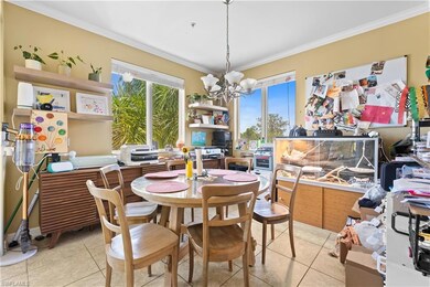 Dining space featuring an inviting chandelier, orn