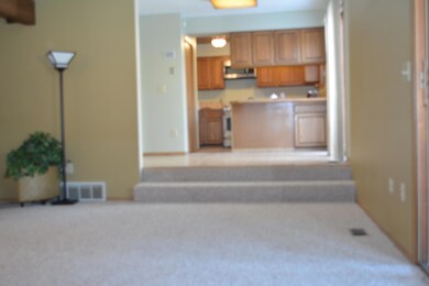 VIEW TO KITCHEN FROM DEN
