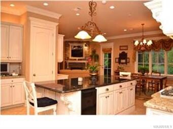 Granite countertops coordinate well with the cabin