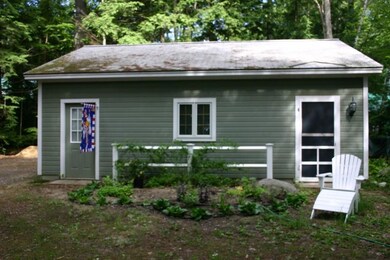 Side of garage with workshop entry