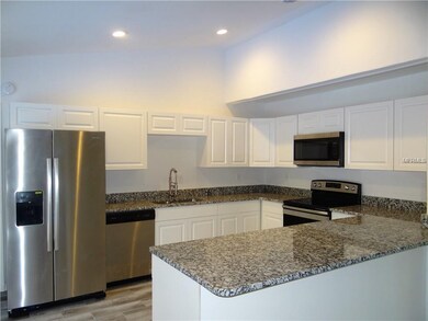 Kitchen:  New Ceramic Tile Flooring, New Cabinets,