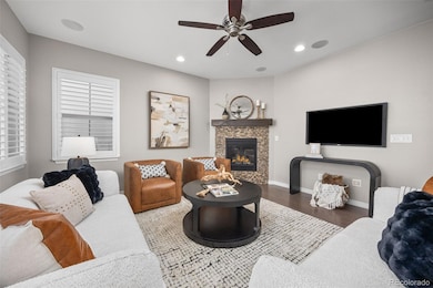 Gas fireplace with stone surround.