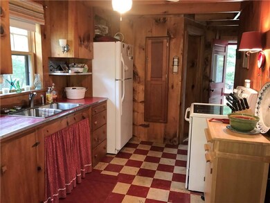 Kitchen with stove and refrigerator....