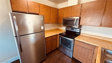 Kitchen with appliances with stainless steel finis
