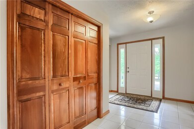 Entry hall and oversized hall coat closet.