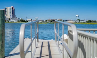 Dock featuring a water view
