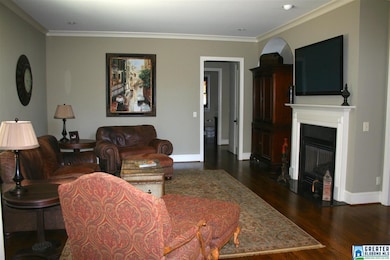 Great room has a beautiful see through fireplace i