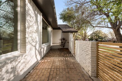 View of side of property with fence