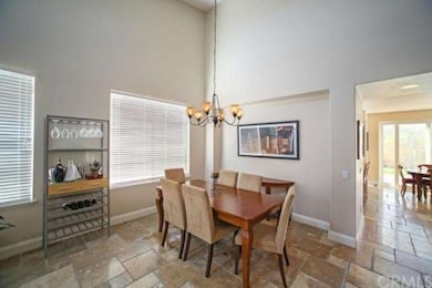 Formal Dining Room with High Ceilings & Built-In B