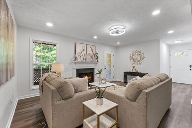 Living room featuring dark wood-type flooring and 