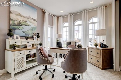 Office featuring light colored carpet
