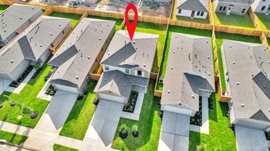 This aerial photo showcases a modern, single-famil