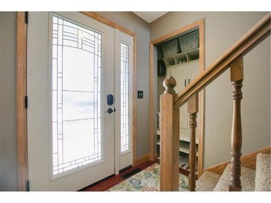 The foyer has been updated with a new front door a