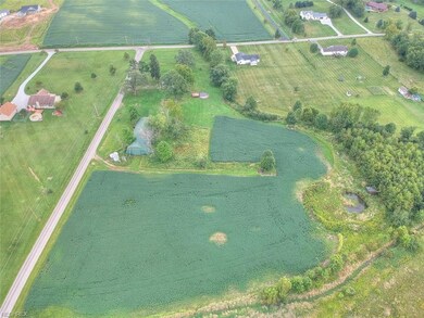 Aerial view showing pond on the right