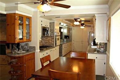 Informal dining area looking into kitchen. Informa