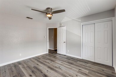 Unfurnished bedroom featuring wood finished floor