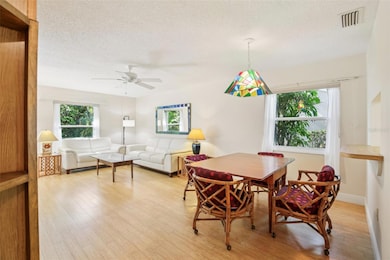 Bright and airy living room with bamboo flooring.