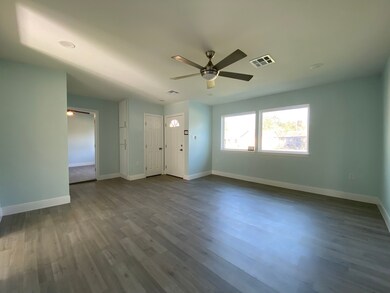 Yes, the living room has a closet and some storage