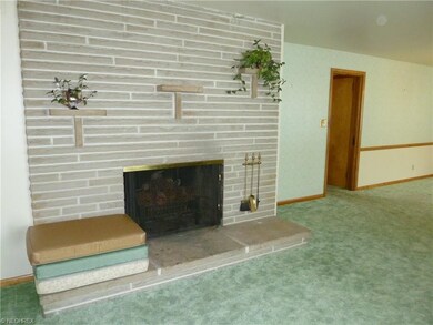 Beautiful brick (decorative) fireplace with stone 