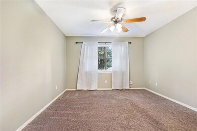 Master bedroom with newly installed carpet and pai