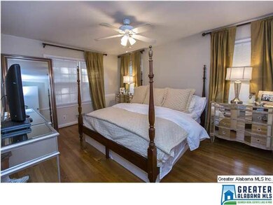 Large Master Bedroom with hardwoods
