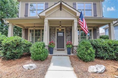 Mature landscaping greets you at the front.