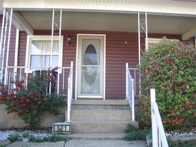 Entrance with covered porch.