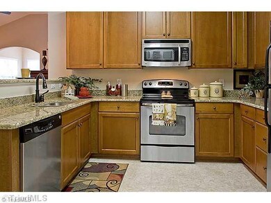 Kitchen. This photo is a representative and not the home listed. Available in November!