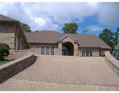 Exterior Front. Aggregate drive leads to great cus