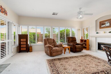 Great-Room w/ Shutters out to the Patio