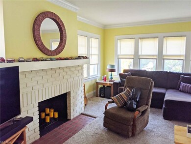 Living Room with Carpet over Wood Floor
