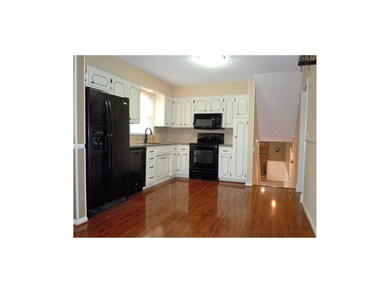 GRANITE COUNTER TOPS! Refrigerator staying.