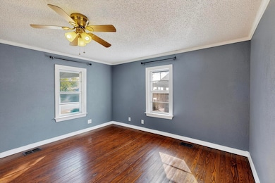 Primary Bedroom, original wood flooring